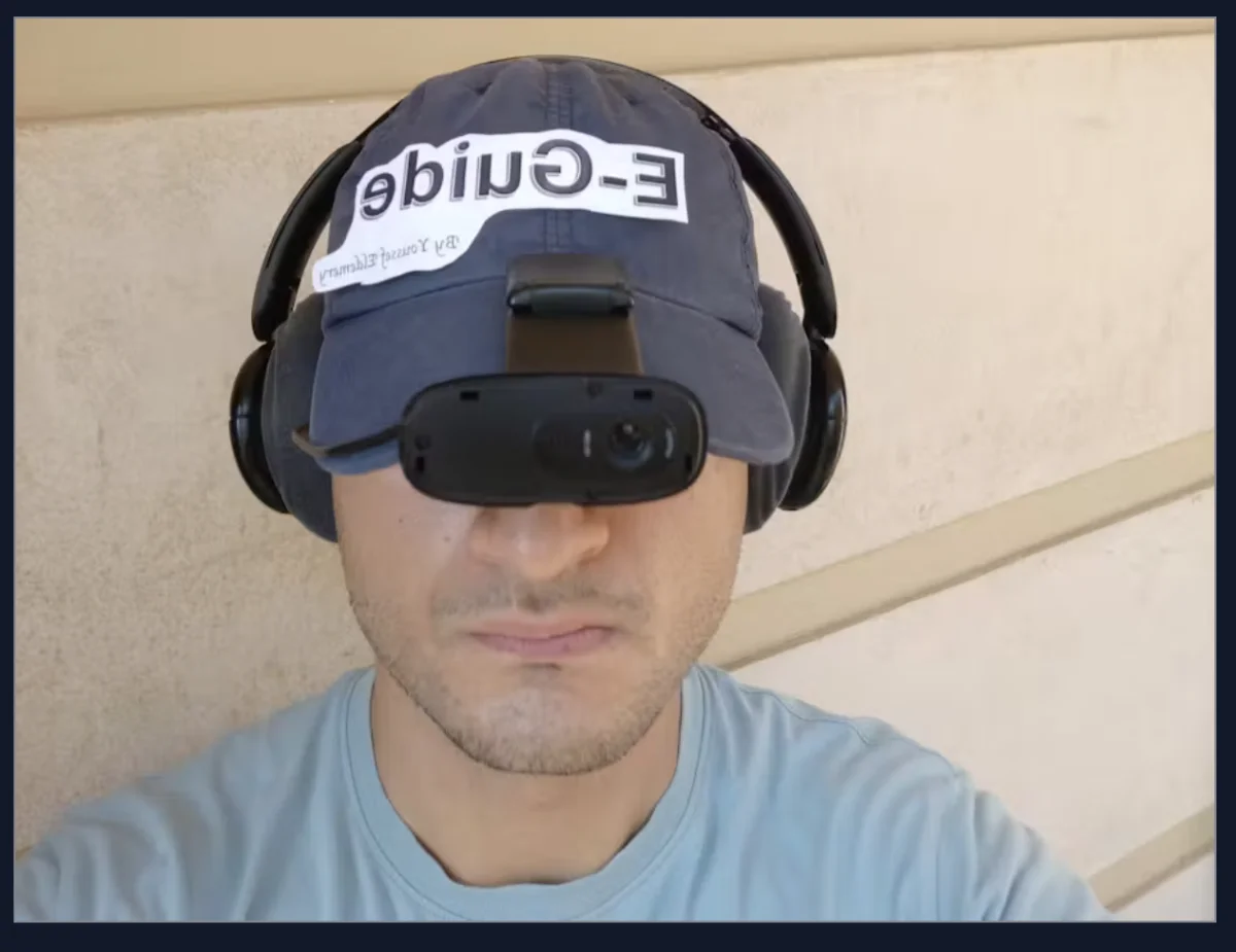 EchoGuide wearable cap with camera and headphones
