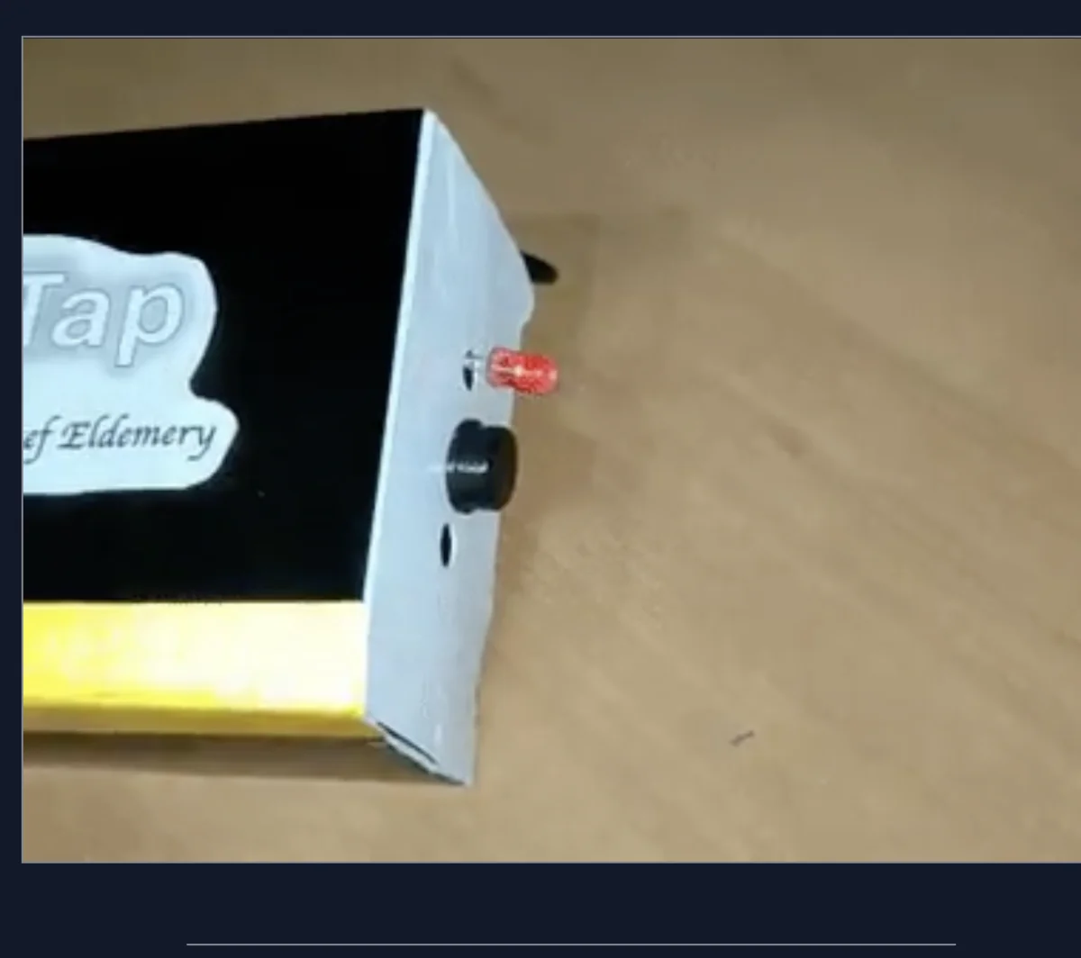 RescueTap enclosure showing the alert button and status LED